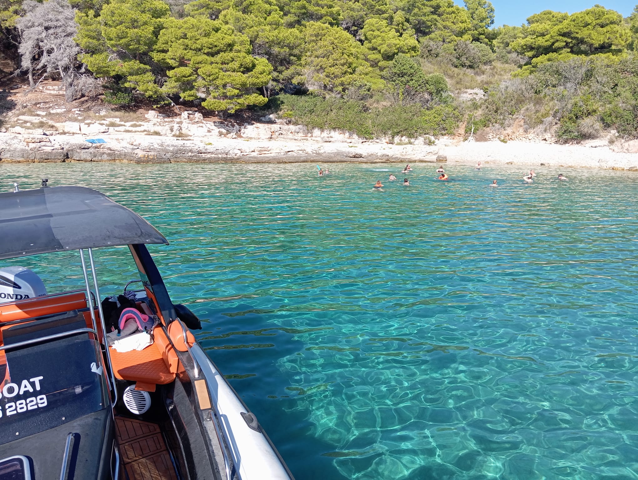 Boat anchored in a clear bay on Čiovo island